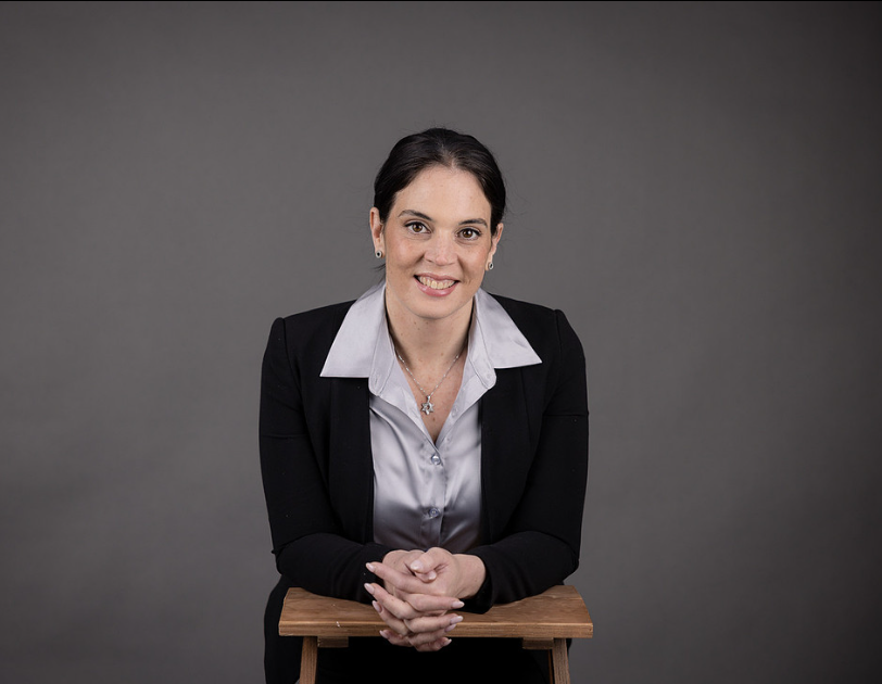 Zisa LeVine seated at her studio portrait session